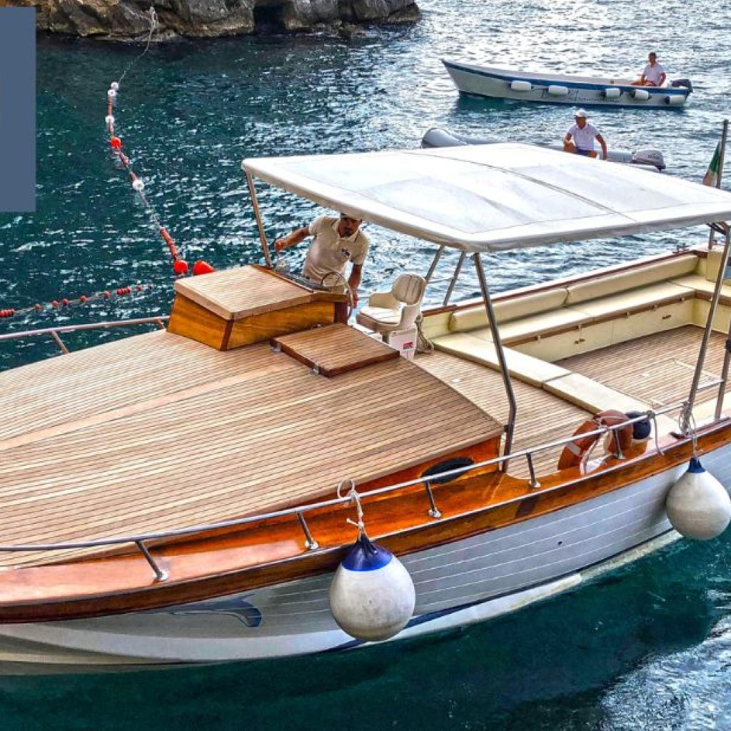 Sunset Day Trip: Positano to Capri Boat Venture